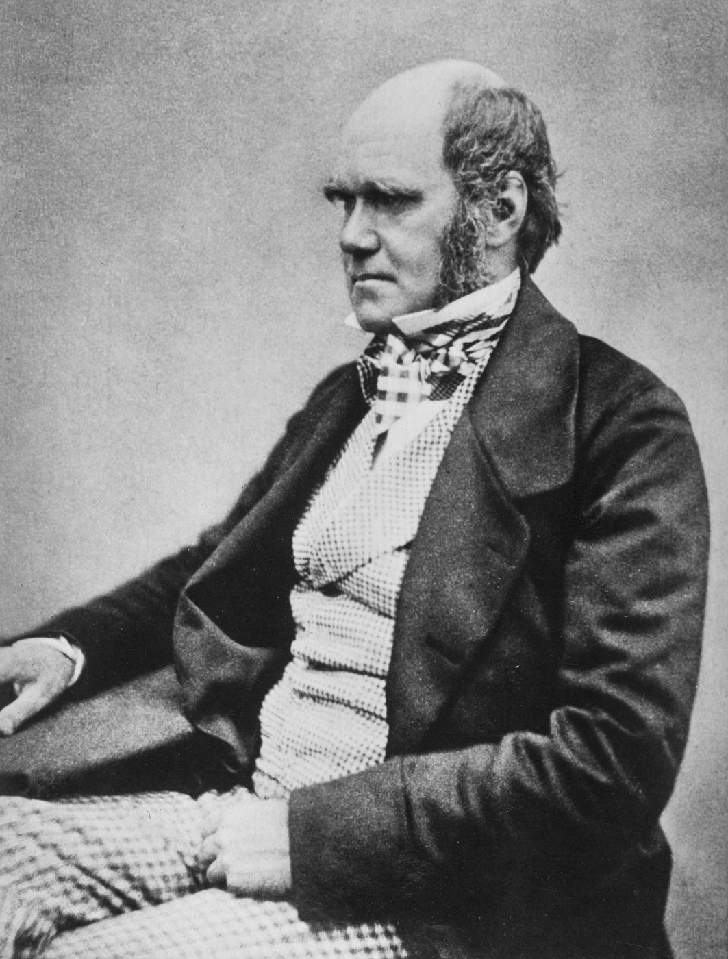 Charles Darwin, c. 1854, years before the 1859 publication of On the Origin of Species, the book that placed him at the center of the 19th-century science-faith debate.
