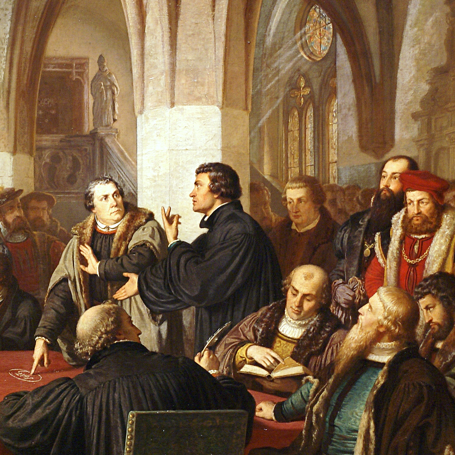 The Marburg Colloquy, 1529: Luther points to the word “Est” (“This IS my body”) he chalked on the table, facing Zwingli. They agreed on 14 of 15 articles, but split forever on the last, the Lord's Supper.